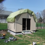 Delivery of shed with temporary runners for transport